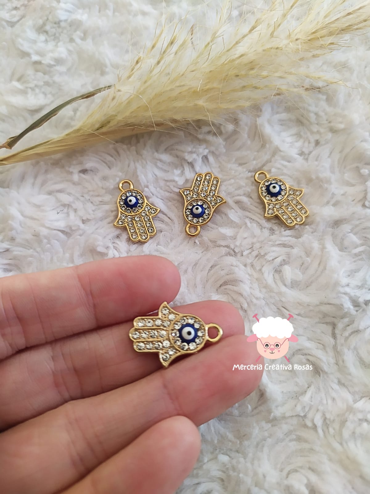 Dije strass manito con ojo